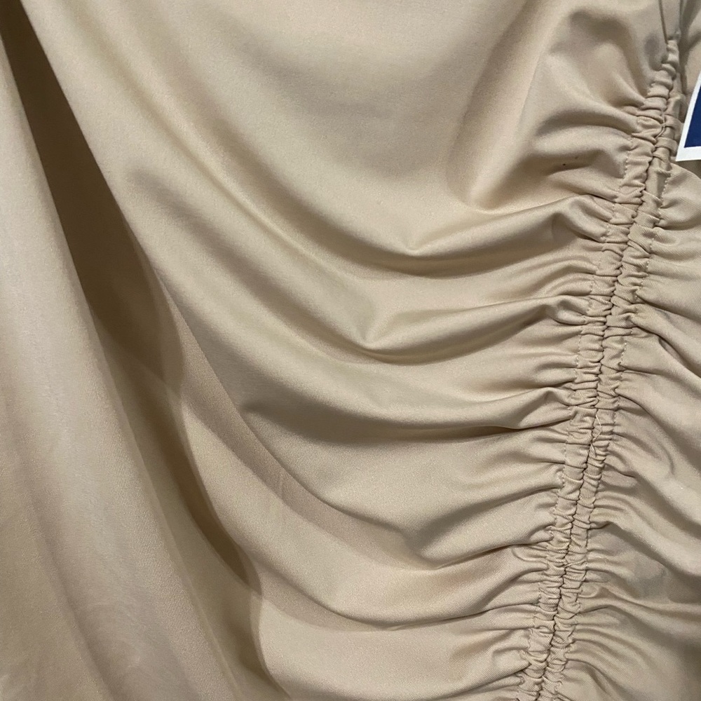 Saints Skirt
Color: Cream/beige
Size: Large